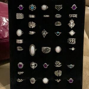 Silver and Purple Geometric Rings with Intricate Designs Coming Soon